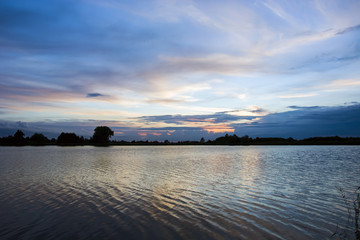 Colorful clouds over the lake