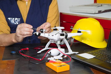electrician fitting a quadcopter