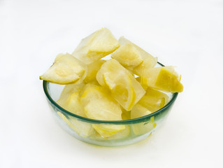 Ice cubes with frozen lemons