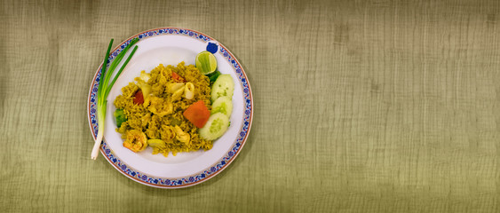 A Dish of Stir Fried Rice with Curry, Squid and Shrimp