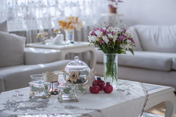 Flowers on white table in room