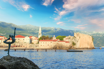 Beautiful view of the sculpture Ballerina Dancer of Budva at sunset, Budva, Montenegro