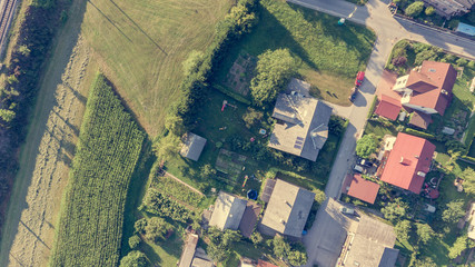 Drop down view of houses in rural environment.