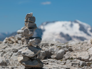 Stones Piled on Each Other and Mountain Ridge in Italian Dolomit