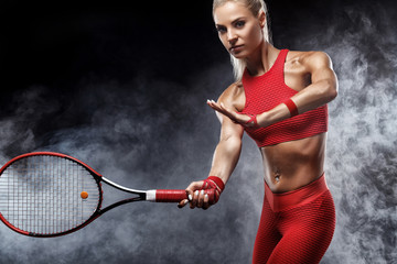 Beautiful blonde sport woman tennis player with racket in red costume
