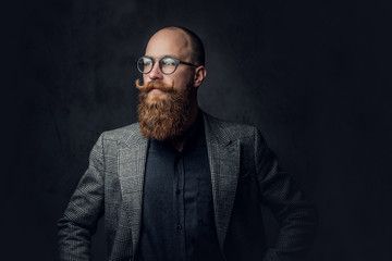 Obraz premium Redhead bearded male in a suit.
