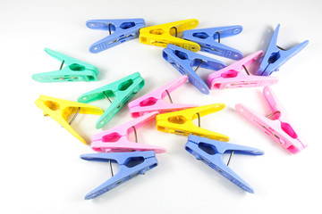 Color clothes-peg isolated on white background.
