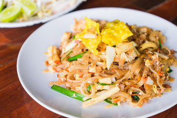 Pad thai or stir fry noodles on the table.