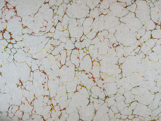 Marbled paper background.