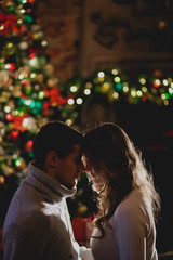 Fototapeta na wymiar Couple celebrates new year/Christmas
