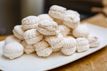 White sweet mini marshmallows in a bowl 