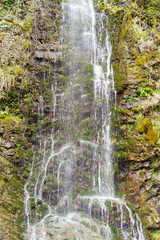 Beautiful waterfall amid vegetation