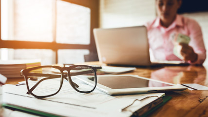 Business colleagues are discussing in the conference room. With documentation about the loan to buy...