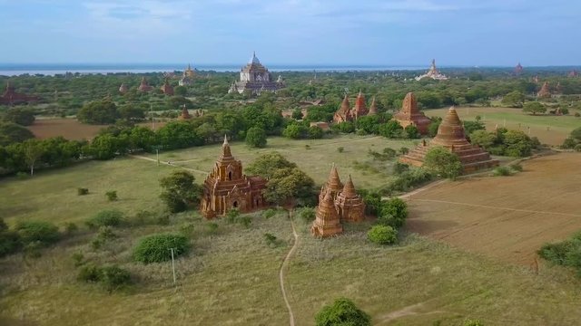 Typical burmese pan view of minor Sin Myar Shin pagadoas, and Pa thada pagoda and temples. Great Ananda Temple as background, Old Bagan