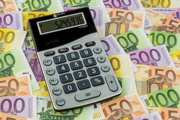 calculator and euro bills