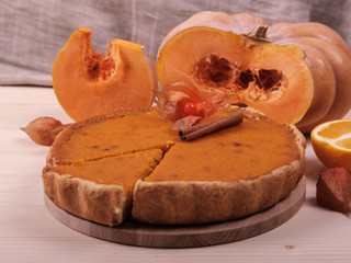 American pumpkin pie, pumpkin, orange and physalis