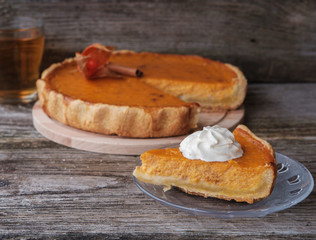 Pumpkin pie with whipped cream