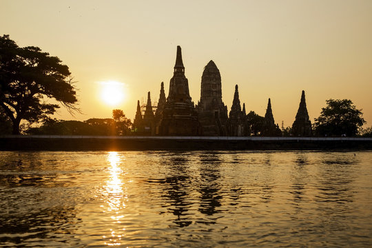 Wat Chaiwatthanaram silhouette on sunset at Ayutthaya, Thailand. The ruined capital of an ancient state.