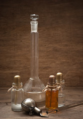 Obraz na płótnie Canvas Vials of perfume oils in fragrance lab