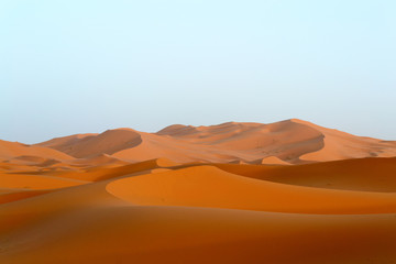Fototapeta na wymiar Merzouga sand dunes in evening sun, Morocco