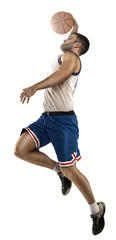 Basketball player in action isolated on white background