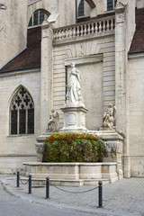 France, Departement Jura, Dole: Statue in front of the old abbey church in the center of the city near Doubs river.