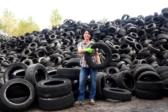 Woman In A Tire Recycling Plant