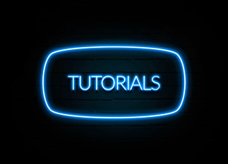 Tutorials  - colorful Neon Sign on brickwall