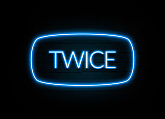 Twice  - colorful Neon Sign on brickwall