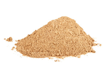Pile of cinnamon powder isolated over white background