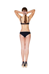 Full length portrait of young woman wearing black underwear