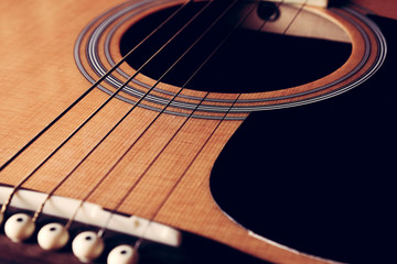 Obraz premium Close Up shot photo of Classic acoustic guitar with filter effect retro vintage style