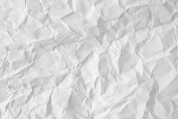 Fototapeta premium Crumpled white paper background texture
