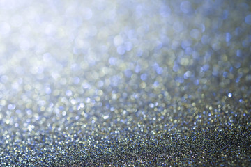 Abstract Christmas twinkled bright background with bokeh defocused lights . Lights Festive background concept.