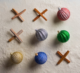 Christmas ornaments and Spices on snow cinnamon Tic Tac Toe holidays, celebrations, fresh, new...