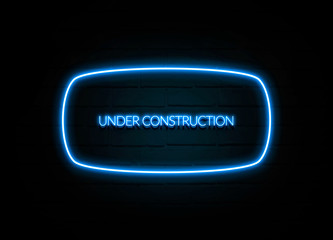 Under Construction  - colorful Neon Sign on brickwall