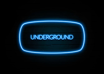 Underground  - colorful Neon Sign on brickwall