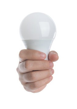 Hand holding a LED light bulb isolated on white background,Front view