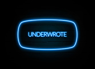 Underwrote  - colorful Neon Sign on brickwall