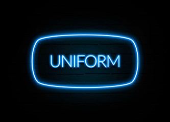 Uniform  - colorful Neon Sign on brickwall