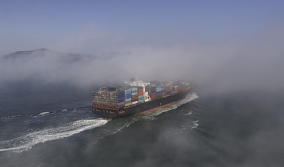 Cargo ship in the fog