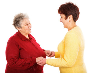 Elderly woman and young caregiver