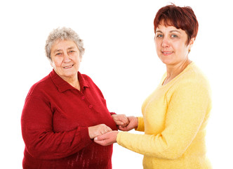 Elderly woman and young caregiver