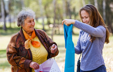 Happy elderly woman with her daughter