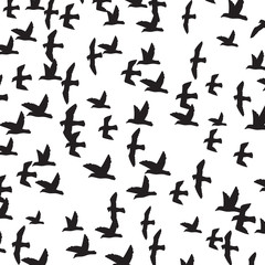 Fototapeta na wymiar background pattern with a flock of flying birds