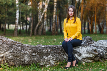 Beautiful young lady in the nature