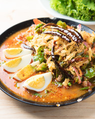 Thai bean spicy salad with boiled eggs on wood ,thai food