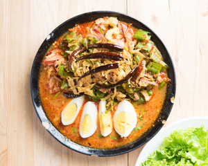Thai bean spicy salad with boiled eggs on wood ,thai food