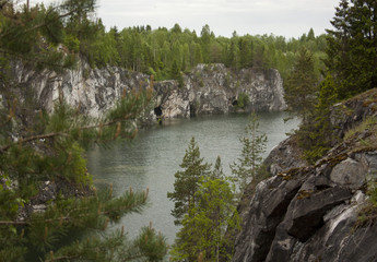 The lake and cliffs. Nature in the rocky mountains.