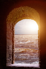 Sea  landscape through stone window